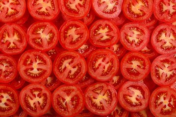 Sliced tomato background. Top view.