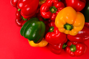 Fresh red, yellow, green bell pepper background. 