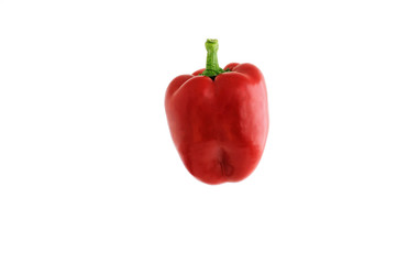 Sweet red pepper on a white background. Space for text or advertisement.