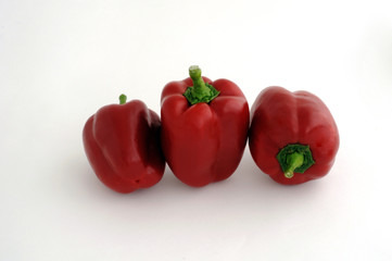 Sweet red pepper on a white background. Space for text or advertisement.