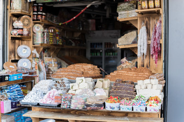 Selling cakes on the street market © focusandblur