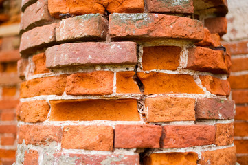 pillar, part of an antique building with a crumbling brick. close up © Вячеслав Думчев