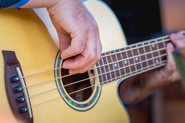 Fototapeta premium The musician plays the guitar. Concert popular music_