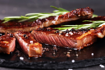 Barbecue Rib Eye Steak or rump steak - Dry Aged Wagyu Entrecote Steak on rustic background
