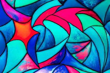 Small fragment of a beautiful colorful stained glass background in trendy colors. Abstract background..
