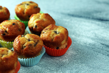 Chocolate muffin and nut muffin, homemade bakery on beautiful rustic background