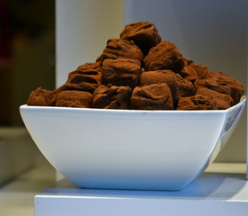 Chocolate truffles in a white bowl