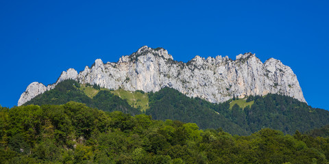 Fototapeta premium The Dents de Lanfon, a mountain in south-eastern France rising to 1824 m. Situated above Talloires on the east bank of Lake Annecy in Haute-Savoie departement of France