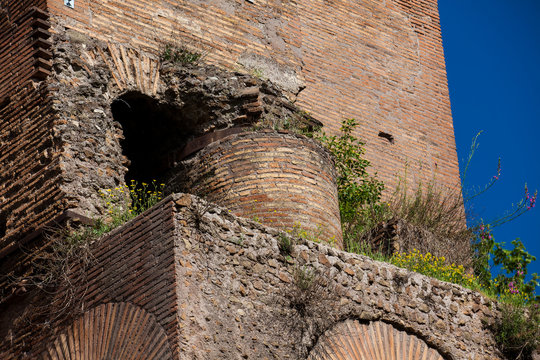 Ruins of an antique monumental fountain called Trofei di Mario built in 226 AD and  located at Piazza Vittorio Emanuele II in Rome