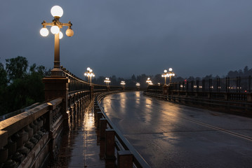 The Colorado Street Bridge in Pasadena during a rainy night.