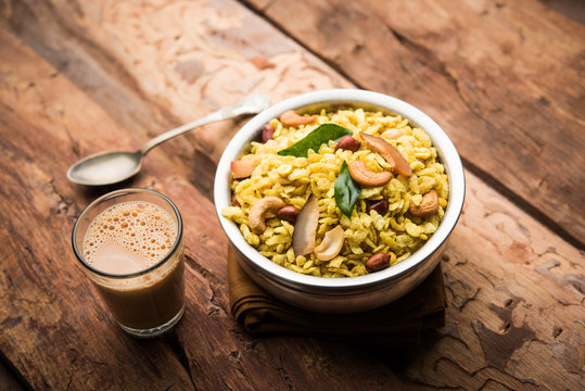 Jada Poha Namkeen Chivda / Thick Pohe Chiwda is a jar snack with a mix of sweet, salty and nuts flavours, served with tea. selective focus