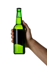 male hand holding green beer bottle without label isolated on white background