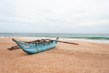 Fisherman boat on the coast of the Indian Ocean