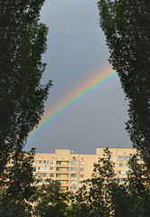 Rainbow over the city after summer rain. Kyiv. Ukraine.