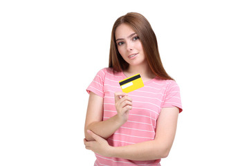 Young woman holding credit card on white background