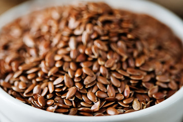 flax seed in white bowl