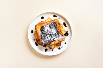 French toasts with blueberry sauce