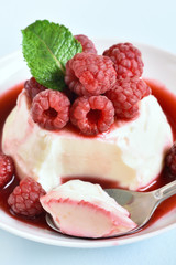 Panna cotta with fresh raspberries