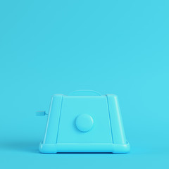 Toaster on bright blue background in pastel colors. Minimalism concept