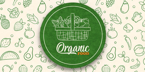 Green organic food label on vegetable background
