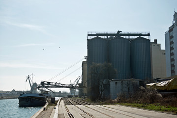 Fototapeta na wymiar Ship dockside and silo installation