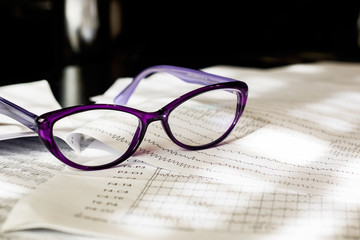 Electroencephalogram result on paper and glasses closeup