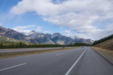 mountain range in banff national park seen from the highway, road trip Canada in fall