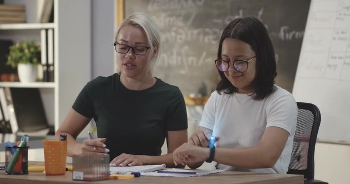 Student using a smartwatch for a video call