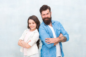 Trust and support. Best friends. Team of dad. Bearded hipster man and adorable child girl. We are team. Family team. Father and daughter teammates. Parenthood and childhood. Fathers day concept