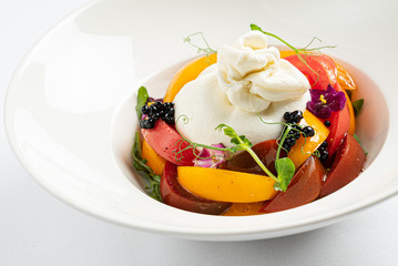 burrata with fresh ripe tomatoes