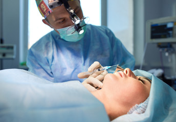 Man surgeon at work in operating room
