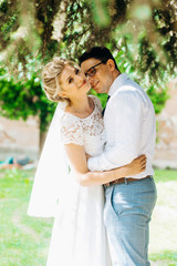 Sweet couple standing on nature background