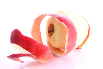 Red apple being peeled