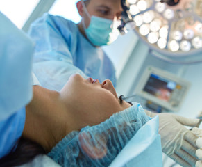 Man surgeon at work in operating room