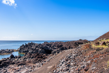 Amazing landscape view to volcanic coastline near ocean hot springs natural pool of Ferraria (Piscina da Ponta da Ferraria), S&atilde;o Miguel Island, Azores, Portugal