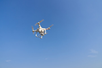 a drone that flies in the sky and takes aerial shots