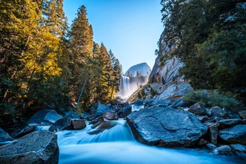 Gordijnen Vernal Falls waterfall of Yosemite National Park from the water that falls into the stones, long exposure photo. California, United States © unai