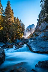 Fototapeten Vernal Falls waterfall of Yosemite National Park from the water that falls on the stones, long exposure vertical photo. California, United States © unai