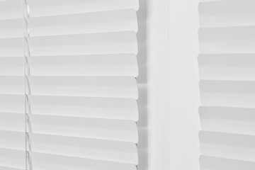 Window with closed modern horizontal blinds indoors, closeup