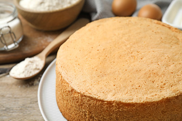 Delicious fresh homemade cake on wooden table, closeup