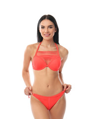 Fototapeta premium Beautiful young woman in stylish bikini on white background