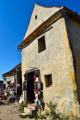 Local market in Transylvania where tourists buy authentic Romanian souvenirs and clothing. Brasov,...