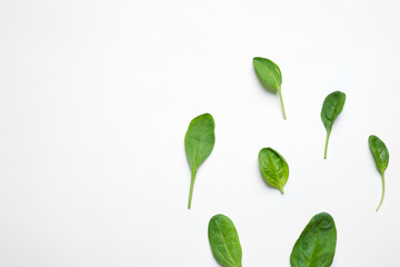 Fresh green healthy spinach on white background, top view
