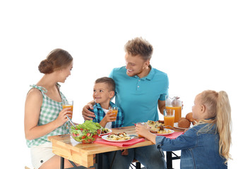 Happy family having picnic at table on white background