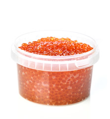Plastic container with red salmon or keta fish caviar on white background. Sea food