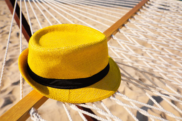 Hammock and hat at seaside. Time to relax