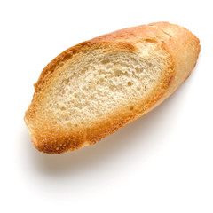 Toasted baguette slice isolated on white background close up.  Toast, crouton.   Top view.