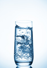 water glass on blue background