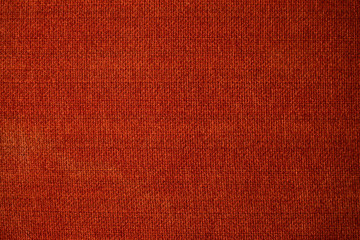 Red fabric textile texture in red color.