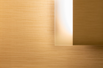 Modern light fixture on a textured wall